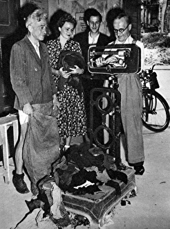 Exchanging Clothes at a Second-hand Depot, Berlin, 1948 Exchanging Clothes at a Second-hand Depot, Berlin, 1948