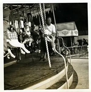 Prints of Fairground Carousel, Hythe, near Southampton, Hampshire, England. Date: 1950s Southampton Prints: Fairground Carousel Print, Hythe, Hampshire, 1950s
