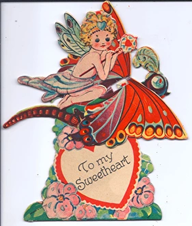 Fairy riding a butterfly on a movable Valentine card Fairy riding a butterfly on a movable Valentine card