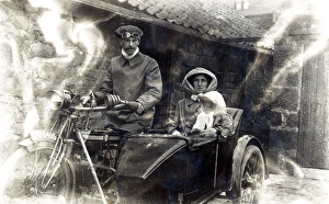 Family of three on a 1914 Twin Rex motorcycle & sidecar Family of three on a 1914 Twin Rex motorcycle & sidecar