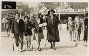 <b class=qtipBold><figcaption>Family Group out for a seaside walk</figcaption></b><br>Family Group out for a seaside walk at a British South Coast beach resort. Date: circa 1930s<br><em>© Grenville Collins Postcard Collection / Tom Gillmor / Mary Evans</em> Family Group out for a seaside walk