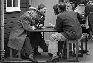 Farmers laugh outside cafe Bury St. Edmunds cattle market Farmers laugh outside cafe Bury St. Edmunds cattle market