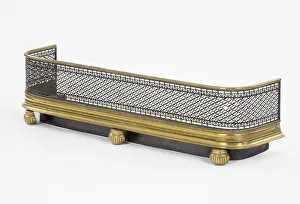 <b class=qtipBold><figcaption>Fender</figcaption></b><br>Brass fender with rounded corners, pierced metal fretwork and reeded bun feet, thought to have been manufactured in c.1800. Date: c.1800<br><em>© The Geffrye Museum of the Home / Mary Evans Picture Library</em> Fender