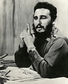Newspaper Gallery: Fidel Castro at Desk