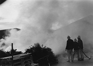 Firefighters in action at a farm near Crediton, Devon Firefighters in action at a farm near Crediton, Devon