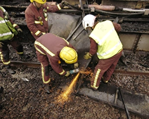 Firefighters using cutting equipment, West London Firefighters using cutting equipment, West London