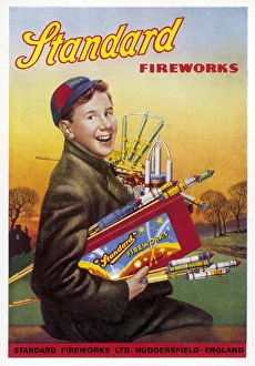 <b class=qtipBold><figcaption>Fireworks Poster</figcaption></b><br>Boy with an armful of fireworks.<br><em>© Mary Evans Picture Library</em> Fireworks Poster