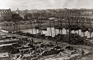 Wick Gallery: Fishing boats and barrels in the harbour at Wick, Scotland