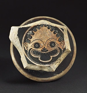 Fragment of Greek glass with a representation Fragment of Greek glass with a representation