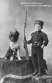 <b class=qtipBold><figcaption>French patriotism</figcaption></b><br>An innocent looking little boy in French soldier's uniform poses with a rifle and a bull dog.<br><em>© Mary Evans/Robert Hunt Collection</em> French patriotism