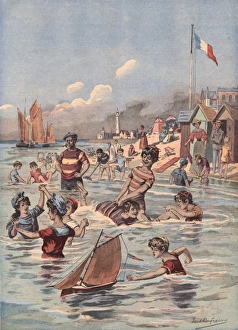 <b class=qtipBold><figcaption>French seaside bathing scene</figcaption></b><br>A seaside bathing scene somewhere on the French coast, with children having fun in the sea. Bathing huts can be seen on the beach in the background. Date: 1906<br><em>© Mary Evans Picture Library</em> French seaside bathing scene