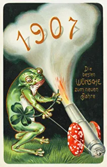 Frog celebrating the arrival of 1907 by firing a cannon Frog celebrating the arrival of 1907 by firing a cannon