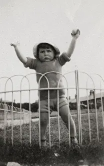 Funny little toddler boy pretending to be a Strongman Funny little toddler boy pretending to be a Strongman