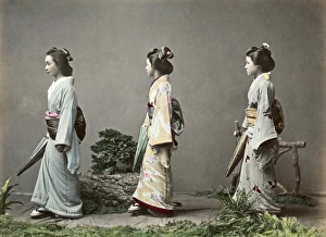 Geishas with parasols and obi sashes, Japan Geishas with parasols and obi sashes, Japan