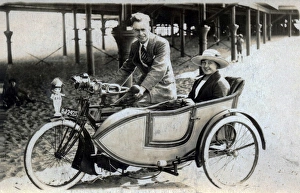 Gentleman & lady on a 1914 Triumph motorcyle & sidecar Gentleman & lady on a 1914 Triumph motorcyle & sidecar