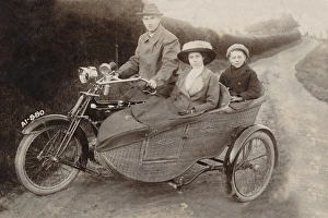 Gentleman & passengers on his 1906 Royal Enfield motorcycle Gentleman & passengers on his 1906 Royal Enfield motorcycle