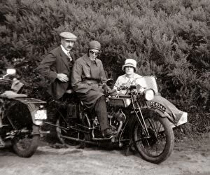 Leathers Gallery: Gentlemen & lady on vintage motorcycle combination at roadsi