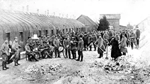 A German band, with top-hatted conductor, in an enemy camp at the front A German band, with top-hatted conductor, in an enemy camp at the front