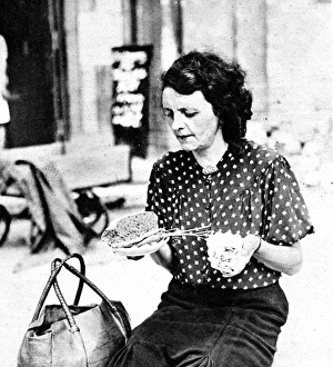 German woman and her daily ration, Berlin, 1945 German woman and her daily ration, Berlin, 1945