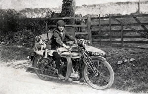 Motorcyclist Gallery: Girl & dog on a 1921 Triumph SD motorcycle & sidecar