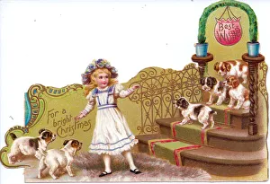 Girl with dogs on a cutout Christmas card Girl with dogs on a cutout Christmas card