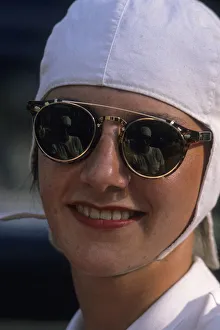 Girl with goggles and white helmet. Vertical format Girl with goggles and white helmet. Vertical format