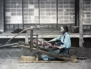 Girl at a loom, Japan circa 1870s. Date: circa 1870s Girl at a loom, Japan circa 1870s. Date: circa 1870s