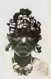 Facial Gallery: Girl from Mali with wonderful beads and headdress