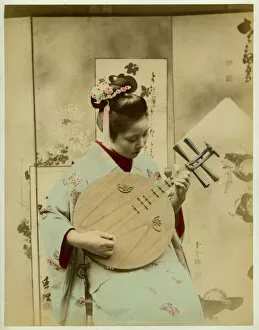 Stringed Gallery: Girl playing instrument