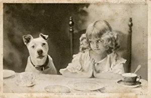 Girl saying Grace but pet dog unwilling Girl saying Grace but pet dog unwilling
