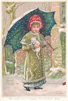 Girl with white kitten on a Christmas card Girl with white kitten on a Christmas card