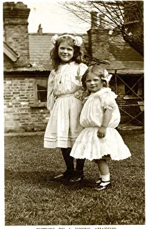 Two girls in a garden, Kodak publicity postcard Two girls in a garden, Kodak publicity postcard