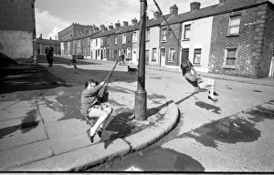Terrace Gallery: Girls playing in Milton Street, Belfast, Northern Ireland