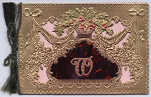 Gold embossed Christmas card with initial T Gold embossed Christmas card with initial T