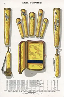 Gold mounted amber jewelry including cigarette Gold mounted amber jewelry including cigarette
