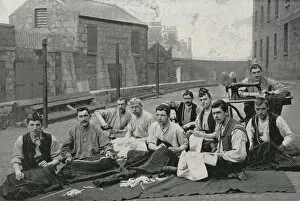 Tobacco Gallery: Gordon Highlanders making kilts in the open air