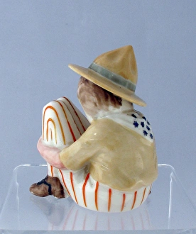 Grafton china figure of a squatting American Doughboy Grafton china figure of a squatting American Doughboy