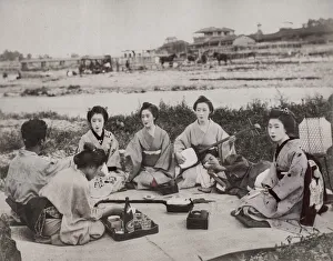 Group of geishas musicians on picnic with man, Japan Group of geishas musicians on picnic with man, Japan