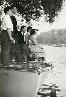 Rowers Gallery: Group watching the Henley Regatta from boat, July 1958