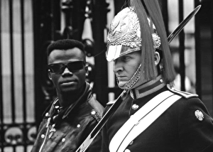 Guardsman with tourist, Whitehall, London Guardsman with tourist, Whitehall, London