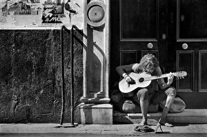 Flamenco Gallery: Guitarist on doorstep, Cadiz