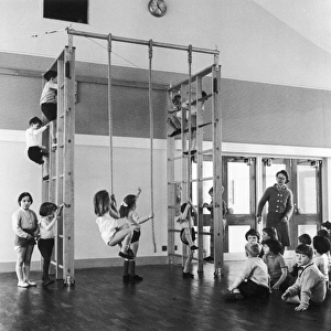 <b class=qtipBold><figcaption>Gym Class in Progress</figcaption></b><br>Physical Exercise - gym class in progress at Danesfield County Primary School, Buckinghamshire<br><em>© Mary Evans Picture Library/HENRY GRANT</em> Gym Class in Progress