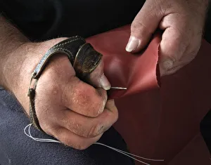 The hands of sailmaker William Leitch, in his sail loft The hands of sailmaker William Leitch, in his sail loft