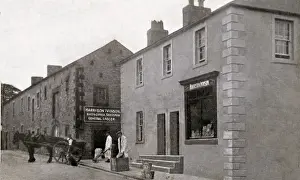 Prints of Harrison Ivinson (later to become Eddie Stobarts first shop), Wigton, near Carlisle, Cumbria, England. Date: 1900s Carlisle Prints: Harrison Ivinson Print, Wigton, Cumbria, England, 1900s