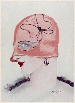 <b class=qtipBold><figcaption>Hat & Mask in One 1929</figcaption></b><br>Dual purpose headwear: cloche hat worn so low over the eyes that it doubles as a mask. Eyeholes are cut in the crown. Perfect hat for hiding upper facial flaws.<br><em>© Mary Evans Picture Library</em> Hat & Mask in One 1929