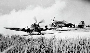 Passing Gallery: Hawker Typhoon Ib with Spitfire IXb passing in Normandy