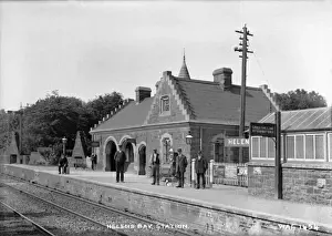 Prints of Helens Bay Station - a view of the railway station and platform with railway employees. (Location: Northern Ireland: County Down: Helens Bay). Date: circa early 1900s Railway Prints: Early 1900s Helens Bay Station Print - Northern Ireland