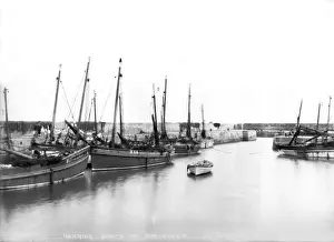 Prints of Herring Boats at Portavogie - a view of the fishing boats at Portavogie harbour. (Location: Northern Ireland; County Down; Portavogie). Date: circa early 1900s Down Prints: Herring Boats at Portavogie Print circa early 1900s