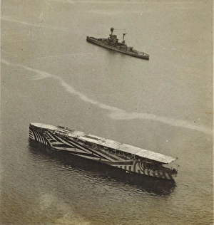 HMS Argus (I49) in habour in 1918, painted in camouflage HMS Argus (I49) in habour in 1918, painted in camouflage