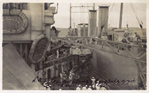 Recovery Gallery: HMS Pegasus alongside HMS Marlborough recovering seaplane